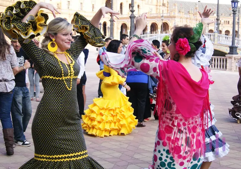 Women from Seville dancing Sevillanas