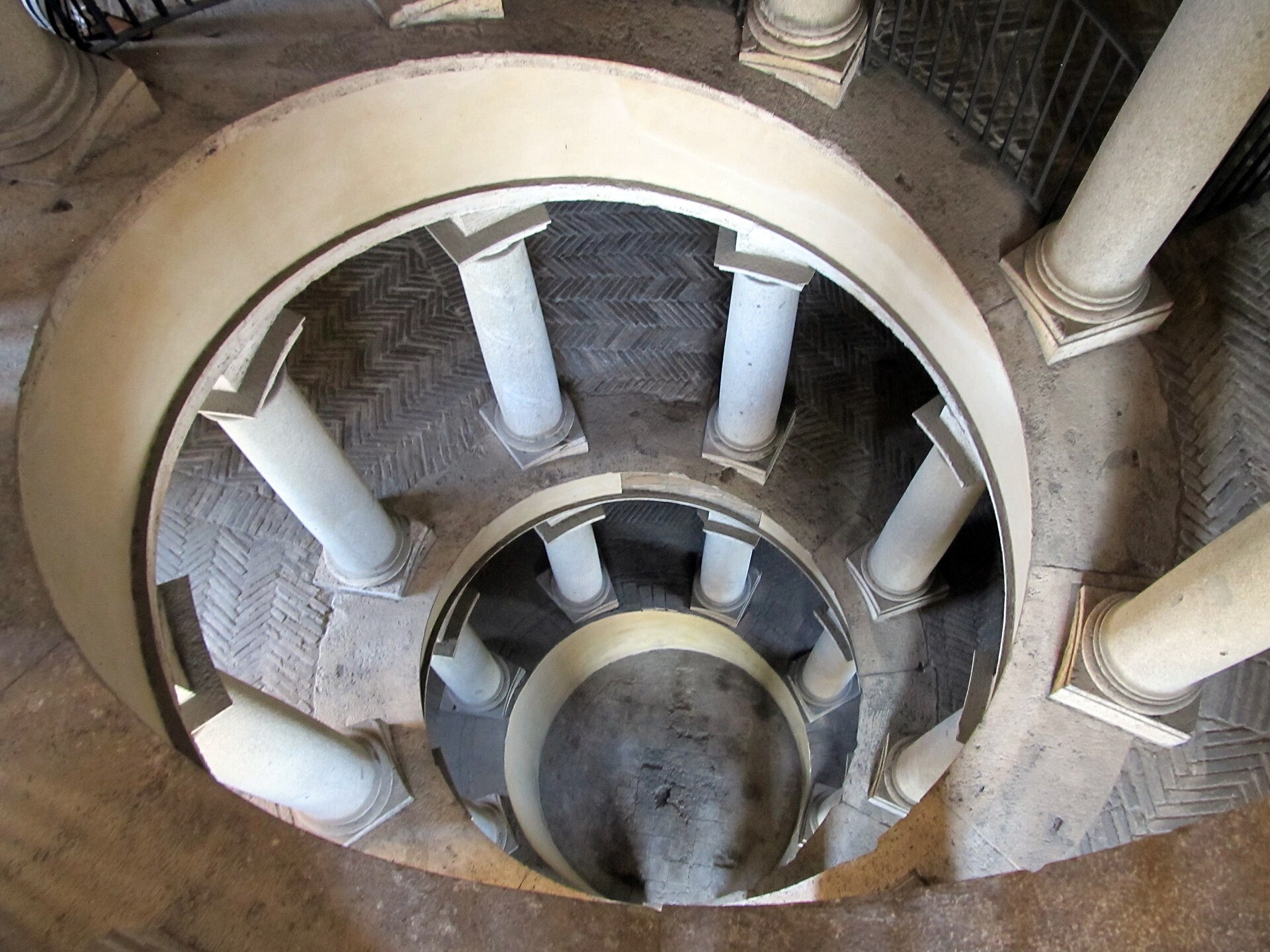 Donato Bramante's original spiral ramp seen from above, a helical brick ramp supported on classical stone columns