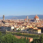 Florence from Piazzale Michelangelo: Brunelleschi's dome and Giotto's bell tower on the right, the tower of the Palazzo Vecchio on the left and the Arno below