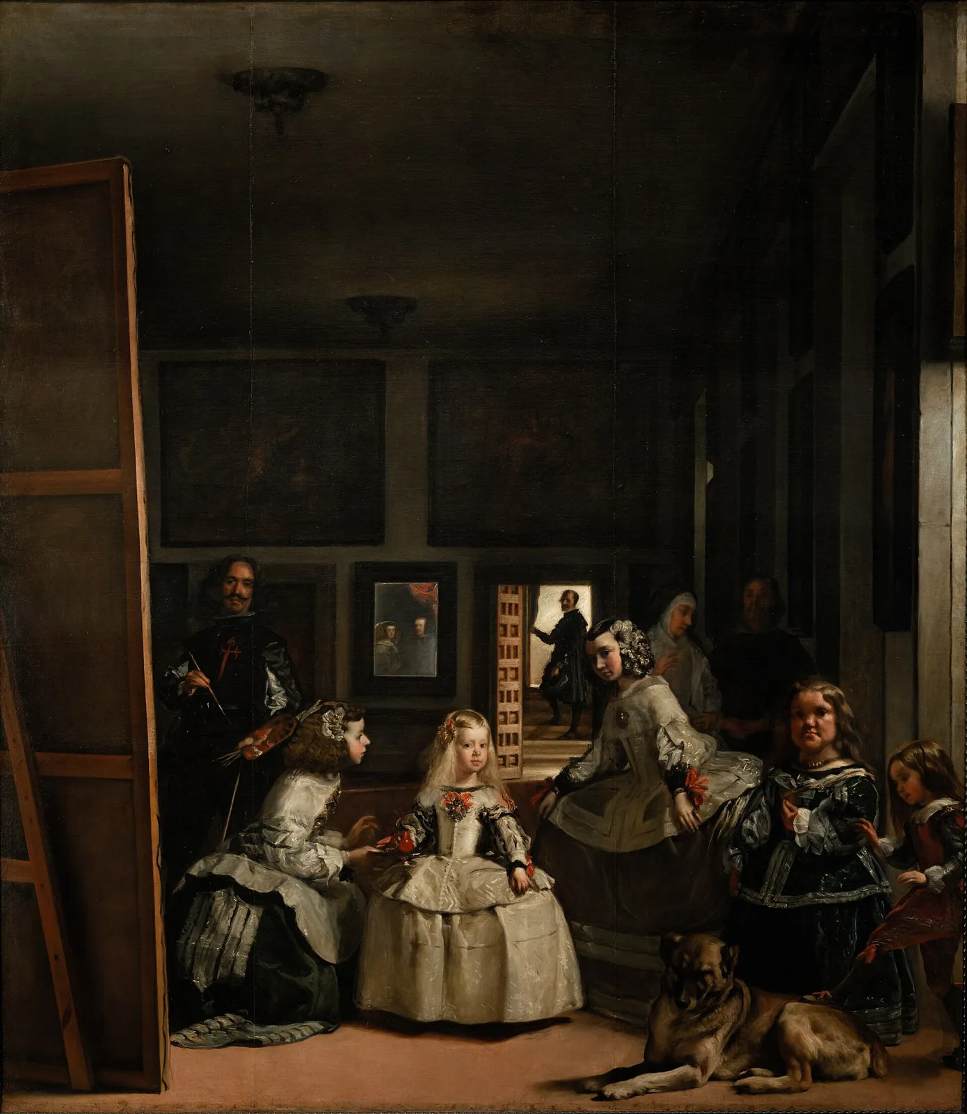 Las Meninas by Velázquez: the Infanta Margarita in the centre with her maids, the painter on the left before a large canvas and the mirror at the back