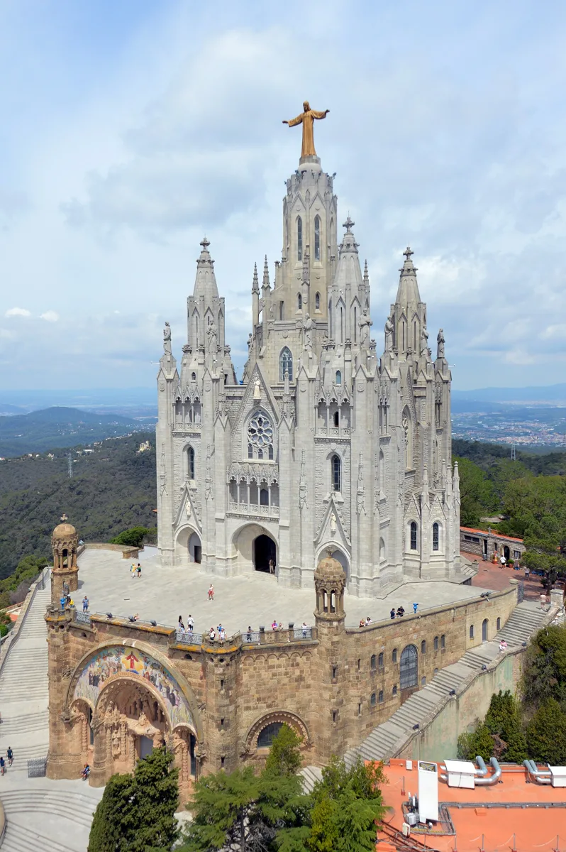 The Temple of the Sacred Heart on Tibidabo seen from above, with the stone crypt below, the white upper church and the statue of Christ on top