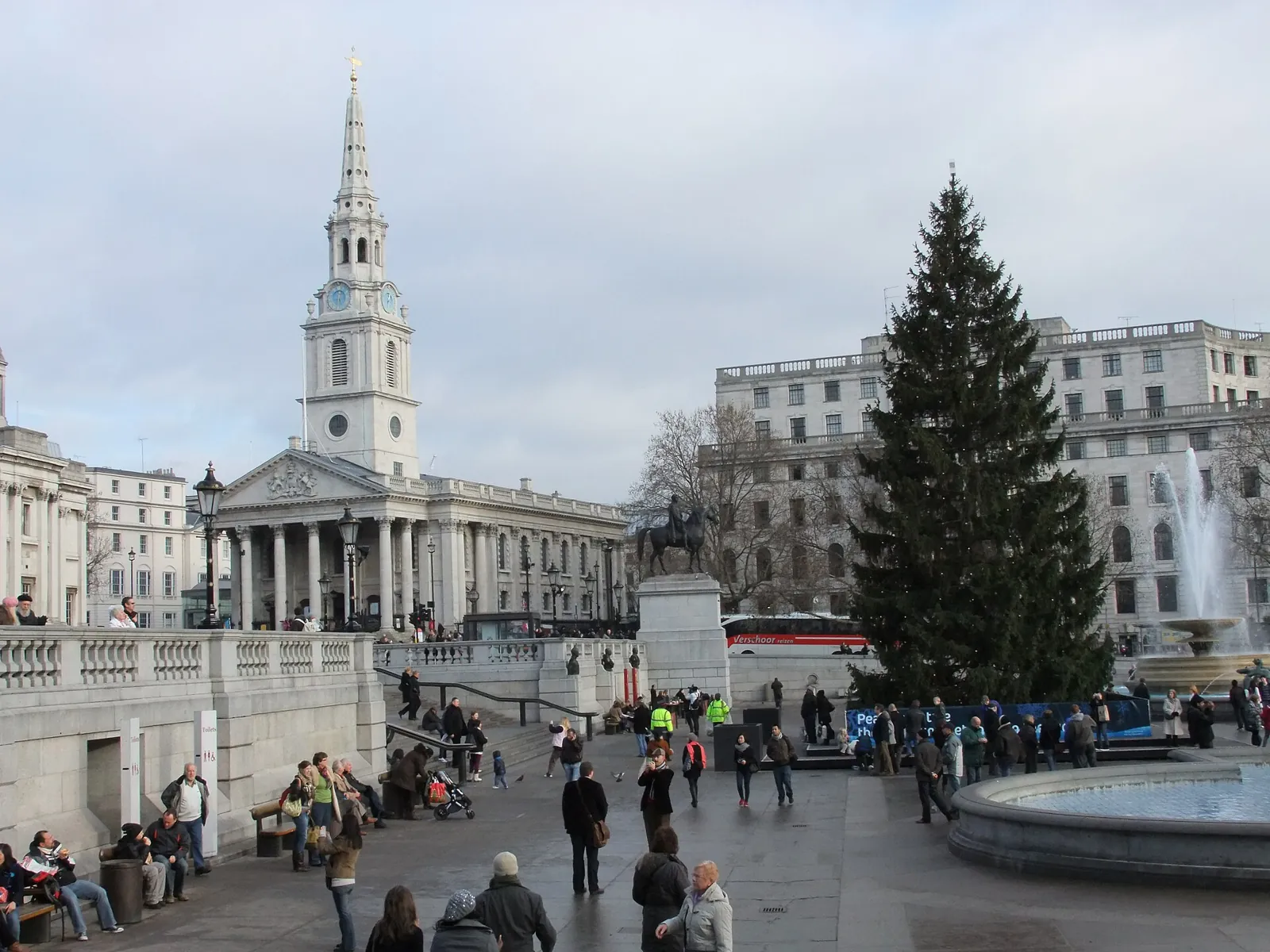 The square's great Christmas tree, with St Martin-in-the-Fields church on the left and the equestrian statue of George IV